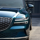 Illustration for article titled The Genesis 'Electrified G80' Is An All-Wheel-Drive Power Bank Rocking Teal Paint
